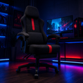 ARTIC black and red gaming chair in dark gaming room with blue and red RGB floor lighting
